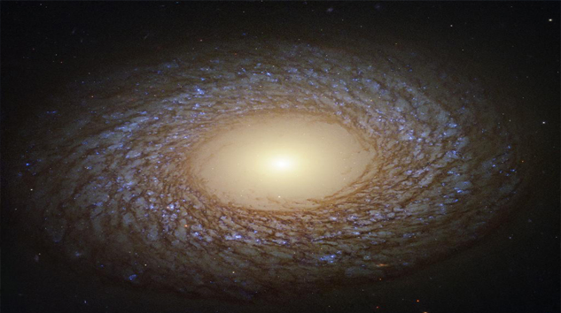Hubble teleskopu ışıklı bir galaksinin fotoğrafını çekti