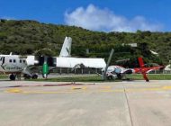 DHC-6 Twin Otter park halindeki helikoptere çarptı